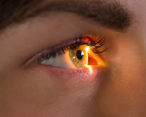 Close up of woman having eye examined